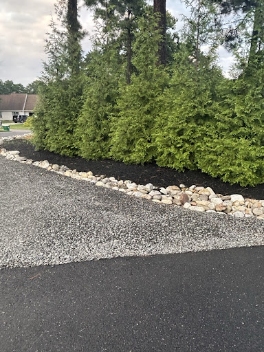 Driveway Stone Transition & River Rock Mulch Edge